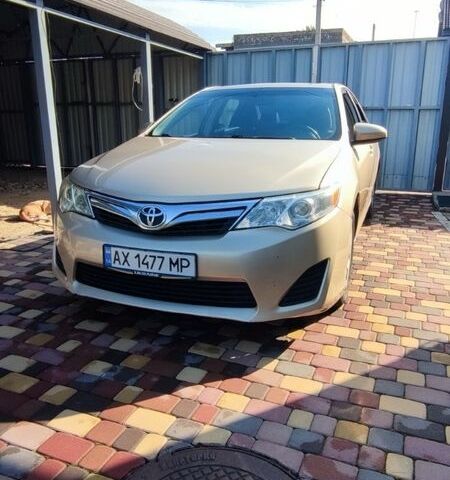 Желтый Тойота Камри, объемом двигателя 2.5 л и пробегом 250 тыс. км за 9000 $, фото 1 на Automoto.ua