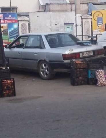 Серый Тойота Камри, объемом двигателя 2 л и пробегом 504 тыс. км за 1700 $, фото 1 на Automoto.ua