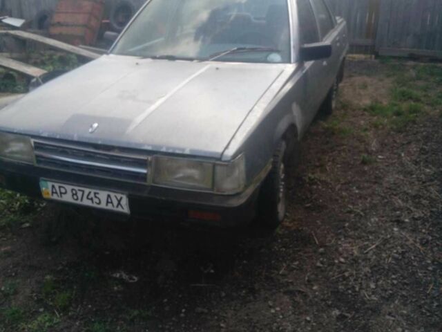 Серый Тойота Камри, объемом двигателя 2 л и пробегом 350 тыс. км за 550 $, фото 1 на Automoto.ua