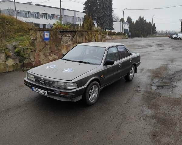 Серый Тойота Камри, объемом двигателя 2 л и пробегом 528 тыс. км за 950 $, фото 1 на Automoto.ua