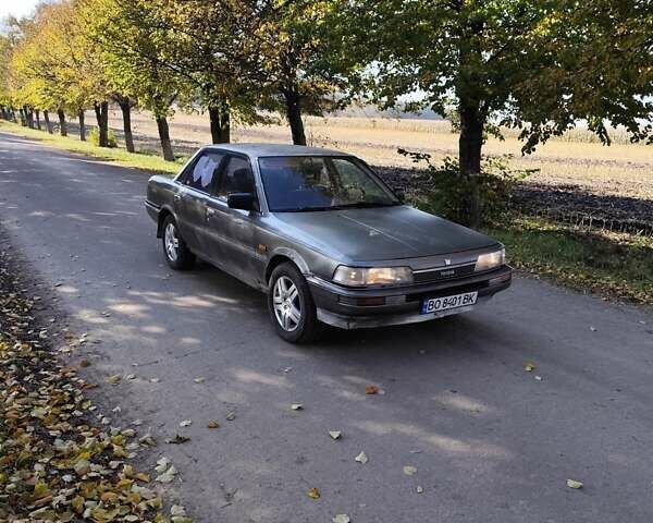 Серый Тойота Камри, объемом двигателя 2 л и пробегом 528 тыс. км за 1000 $, фото 1 на Automoto.ua