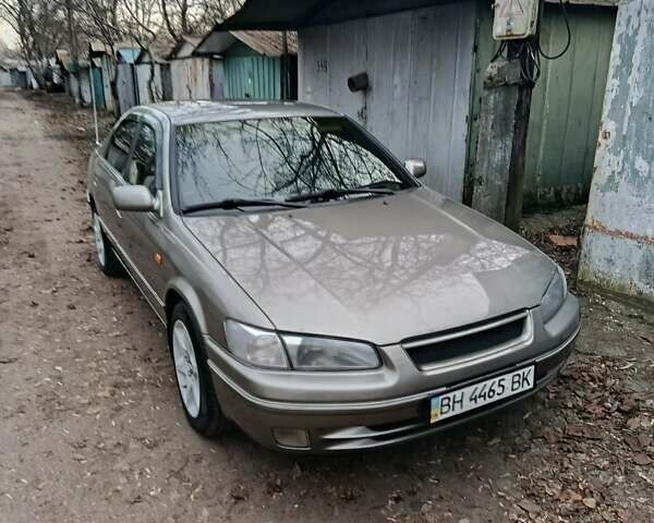 Сірий Тойота Камрі, об'ємом двигуна 2.2 л та пробігом 437 тис. км за 5200 $, фото 1 на Automoto.ua