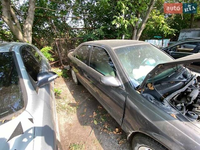 Серый Тойота Камри, объемом двигателя 2.2 л и пробегом 240 тыс. км за 1450 $, фото 1 на Automoto.ua