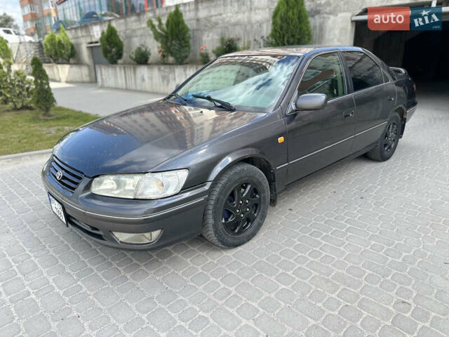 Сірий Тойота Камрі, об'ємом двигуна 3 л та пробігом 250 тис. км за 2700 $, фото 1 на Automoto.ua