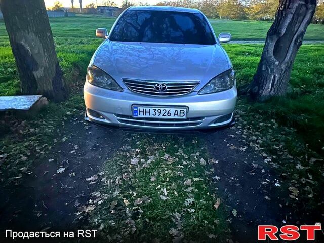 Серый Тойота Камри, объемом двигателя 3 л и пробегом 285 тыс. км за 7000 $, фото 1 на Automoto.ua