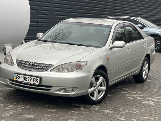 Сірий Тойота Камрі, об'ємом двигуна 2.4 л та пробігом 216 тис. км за 5999 $, фото 1 на Automoto.ua