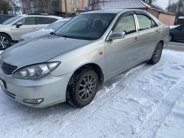 Серый Тойота Камри, объемом двигателя 2.4 л и пробегом 150 тыс. км за 5500 $, фото 1 на Automoto.ua