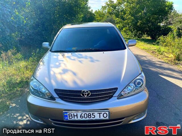 Сірий Тойота Камрі, об'ємом двигуна 3 л та пробігом 390 тис. км за 6000 $, фото 1 на Automoto.ua