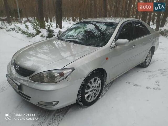 Сірий Тойота Камрі, об'ємом двигуна 2.4 л та пробігом 375 тис. км за 4500 $, фото 1 на Automoto.ua
