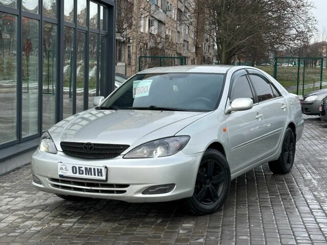 Серый Тойота Камри, объемом двигателя 3 л и пробегом 296 тыс. км за 4800 $, фото 1 на Automoto.ua