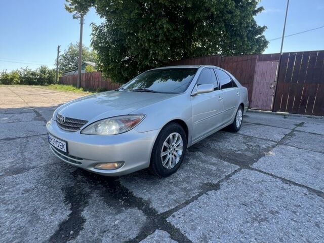 Серый Тойота Камри, объемом двигателя 3 л и пробегом 322 тыс. км за 4500 $, фото 1 на Automoto.ua
