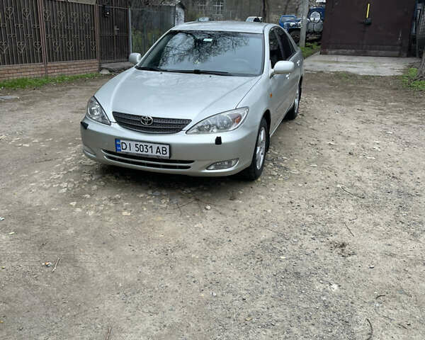 Серый Тойота Камри, объемом двигателя 3 л и пробегом 229 тыс. км за 7000 $, фото 1 на Automoto.ua