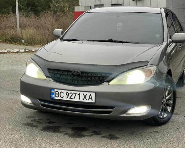 Сірий Тойота Камрі, об'ємом двигуна 3 л та пробігом 384 тис. км за 5500 $, фото 1 на Automoto.ua