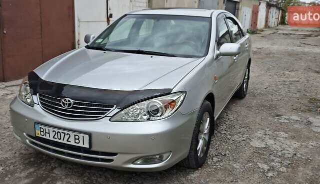 Серый Тойота Камри, объемом двигателя 2.36 л и пробегом 260 тыс. км за 6500 $, фото 1 на Automoto.ua