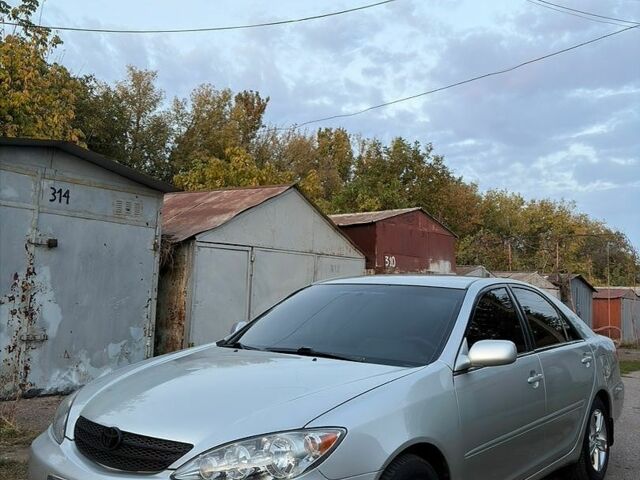 Сірий Тойота Камрі, об'ємом двигуна 3 л та пробігом 258 тис. км за 4800 $, фото 1 на Automoto.ua