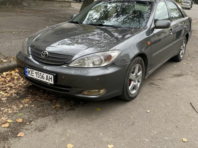 Серый Тойота Камри, объемом двигателя 2.4 л и пробегом 370 тыс. км за 4800 $, фото 1 на Automoto.ua