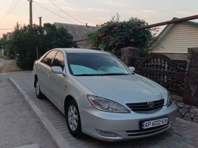 Серый Тойота Камри, объемом двигателя 2.4 л и пробегом 500 тыс. км за 3700 $, фото 1 на Automoto.ua