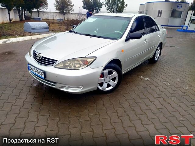 Серый Тойота Камри, объемом двигателя 3 л и пробегом 250 тыс. км за 3950 $, фото 1 на Automoto.ua