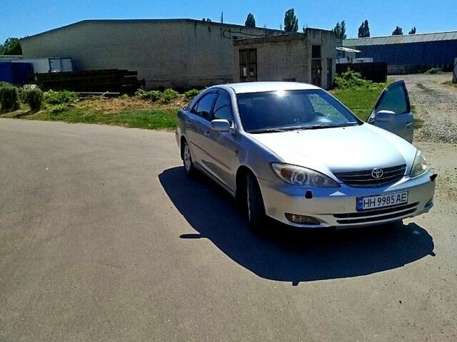 Сірий Тойота Камрі, об'ємом двигуна 2.4 л та пробігом 260 тис. км за 5500 $, фото 1 на Automoto.ua