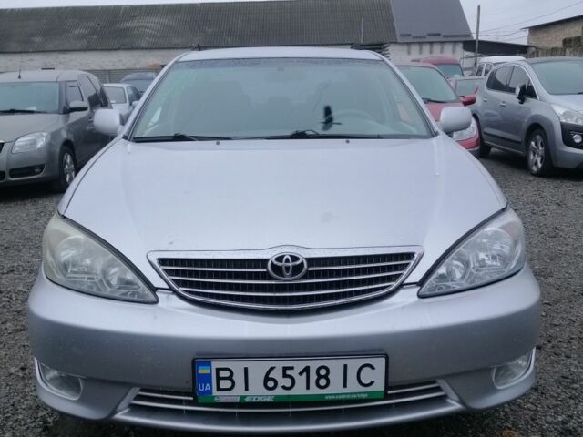 Серый Тойота Камри, объемом двигателя 2.4 л и пробегом 280 тыс. км за 4850 $, фото 1 на Automoto.ua