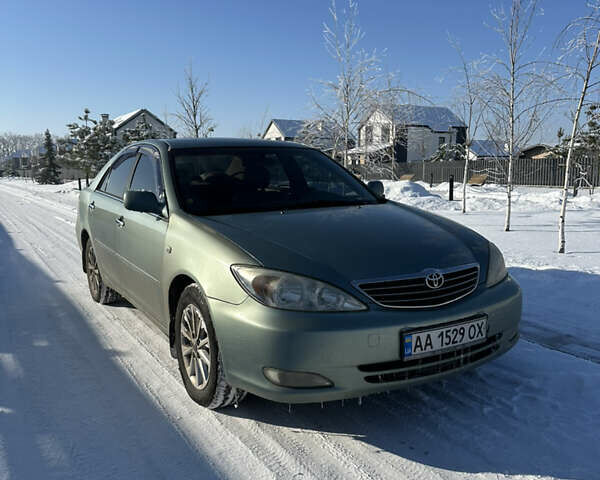 Сірий Тойота Камрі, об'ємом двигуна 3 л та пробігом 248 тис. км за 6500 $, фото 1 на Automoto.ua