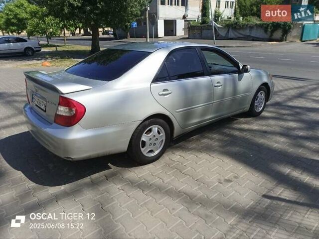 Сірий Тойота Камрі, об'ємом двигуна 2.36 л та пробігом 300 тис. км за 5300 $, фото 1 на Automoto.ua