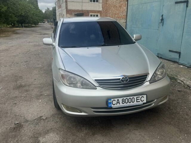 Сірий Тойота Камрі, об'ємом двигуна 2.4 л та пробігом 290 тис. км за 5499 $, фото 1 на Automoto.ua