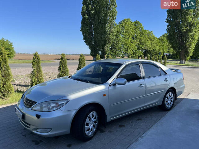 Серый Тойота Камри, объемом двигателя 3 л и пробегом 217 тыс. км за 5700 $, фото 1 на Automoto.ua