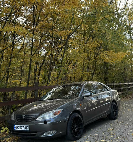 Серый Тойота Камри, объемом двигателя 3 л и пробегом 417 тыс. км за 8000 $, фото 1 на Automoto.ua