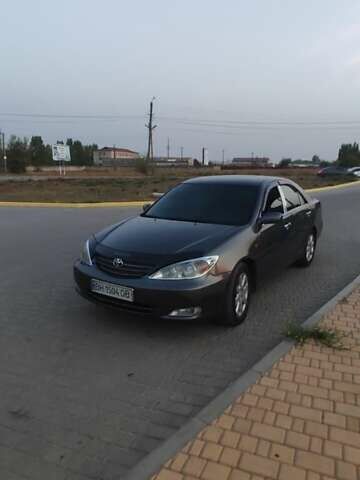 Серый Тойота Камри, объемом двигателя 2.36 л и пробегом 350 тыс. км за 4500 $, фото 1 на Automoto.ua