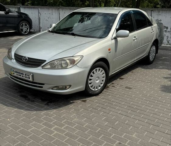 Сірий Тойота Камрі, об'ємом двигуна 2.4 л та пробігом 300 тис. км за 4600 $, фото 1 на Automoto.ua