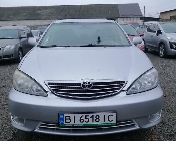 Серый Тойота Камри, объемом двигателя 2.36 л и пробегом 280 тыс. км за 4850 $, фото 1 на Automoto.ua