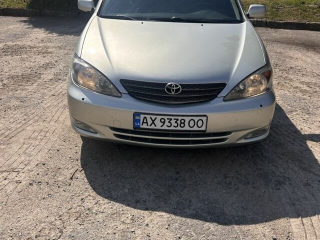 Серый Тойота Камри, объемом двигателя 2.4 л и пробегом 214 тыс. км за 4800 $, фото 1 на Automoto.ua