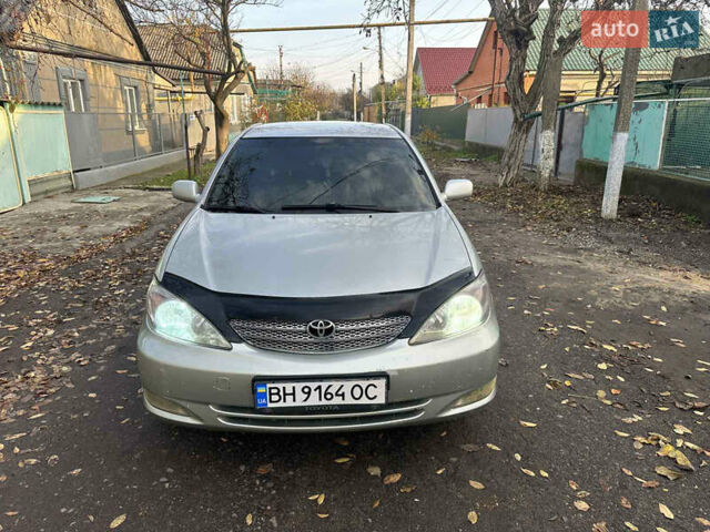 Сірий Тойота Камрі, об'ємом двигуна 2.36 л та пробігом 380 тис. км за 4500 $, фото 1 на Automoto.ua