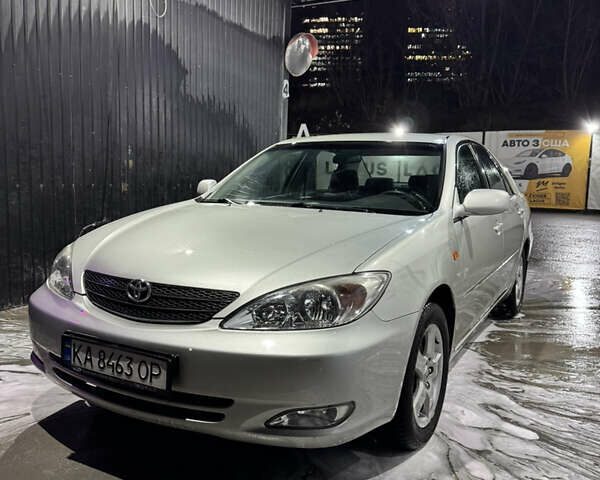 Серый Тойота Камри, объемом двигателя 2.4 л и пробегом 101 тыс. км за 7500 $, фото 1 на Automoto.ua