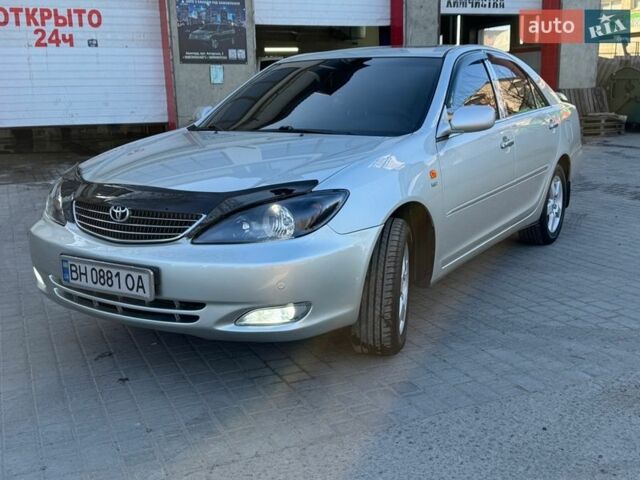 Серый Тойота Камри, объемом двигателя 2.36 л и пробегом 245 тыс. км за 5300 $, фото 1 на Automoto.ua