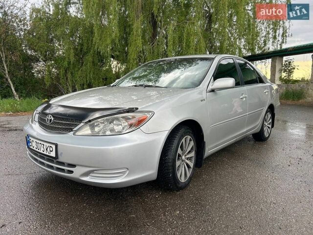 Серый Тойота Камри, объемом двигателя 2.36 л и пробегом 489 тыс. км за 5300 $, фото 1 на Automoto.ua
