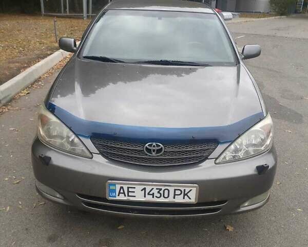 Сірий Тойота Камрі, об'ємом двигуна 2.4 л та пробігом 237 тис. км за 5000 $, фото 1 на Automoto.ua