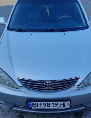 Серый Тойота Камри, объемом двигателя 3 л и пробегом 398 тыс. км за 4900 $, фото 1 на Automoto.ua