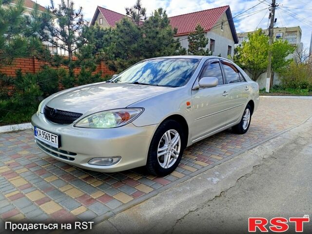 Серый Тойота Камри, объемом двигателя 2.4 л и пробегом 336 тыс. км за 6500 $, фото 1 на Automoto.ua