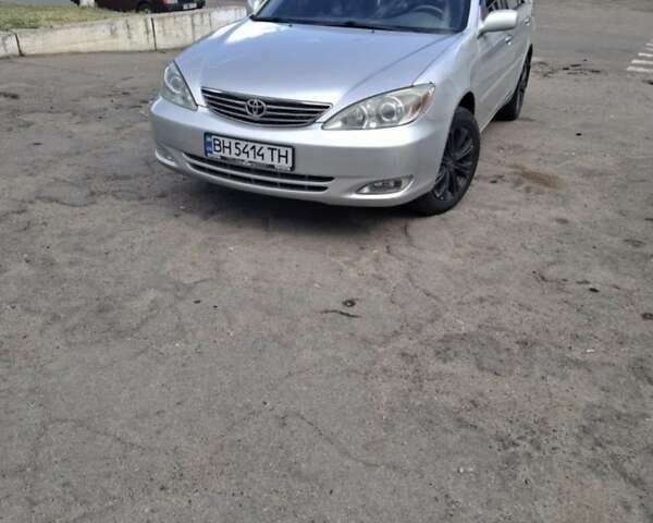 Серый Тойота Камри, объемом двигателя 3 л и пробегом 390 тыс. км за 6200 $, фото 1 на Automoto.ua