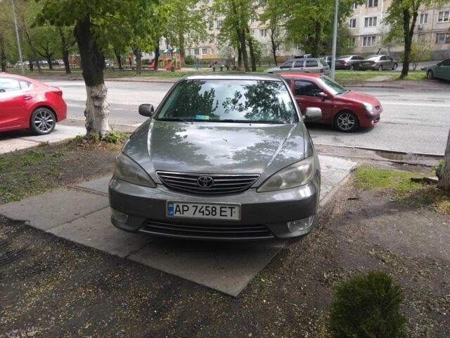 Серый Тойота Камри, объемом двигателя 2.4 л и пробегом 360 тыс. км за 4800 $, фото 1 на Automoto.ua