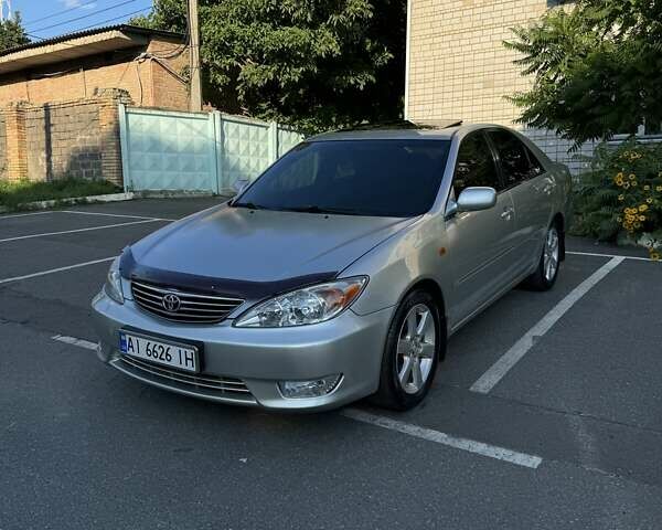 Серый Тойота Камри, объемом двигателя 2.36 л и пробегом 350 тыс. км за 6500 $, фото 1 на Automoto.ua