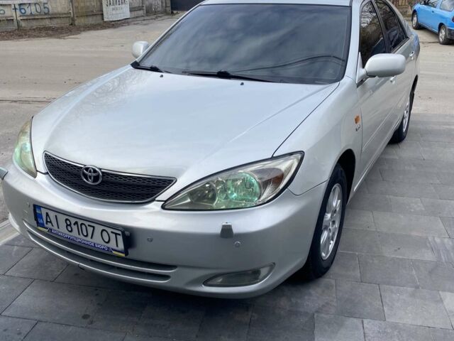Сірий Тойота Камрі, об'ємом двигуна 2.4 л та пробігом 360 тис. км за 5700 $, фото 1 на Automoto.ua