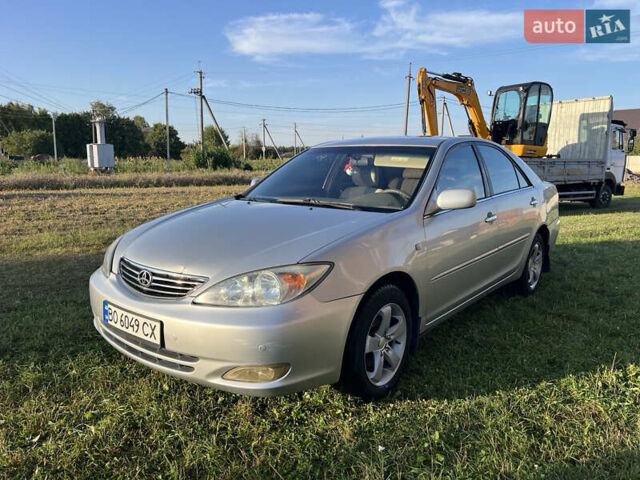 Серый Тойота Камри, объемом двигателя 2.4 л и пробегом 300 тыс. км за 4000 $, фото 1 на Automoto.ua