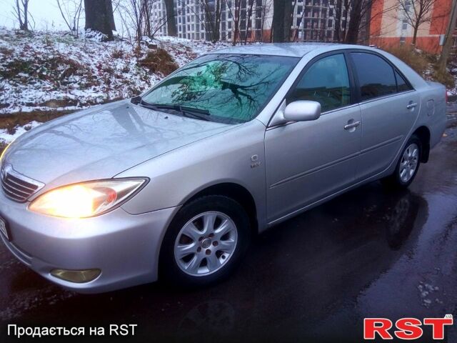 Серый Тойота Камри, объемом двигателя 2.4 л и пробегом 300 тыс. км за 5300 $, фото 1 на Automoto.ua