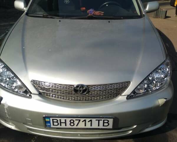 Серый Тойота Камри, объемом двигателя 2.4 л и пробегом 355 тыс. км за 5500 $, фото 1 на Automoto.ua