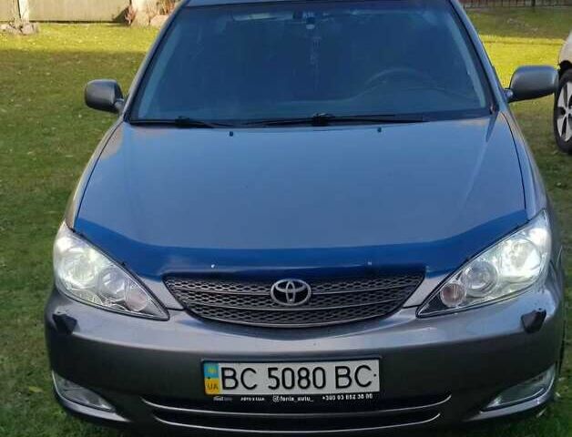 Серый Тойота Камри, объемом двигателя 2.4 л и пробегом 420 тыс. км за 4000 $, фото 1 на Automoto.ua