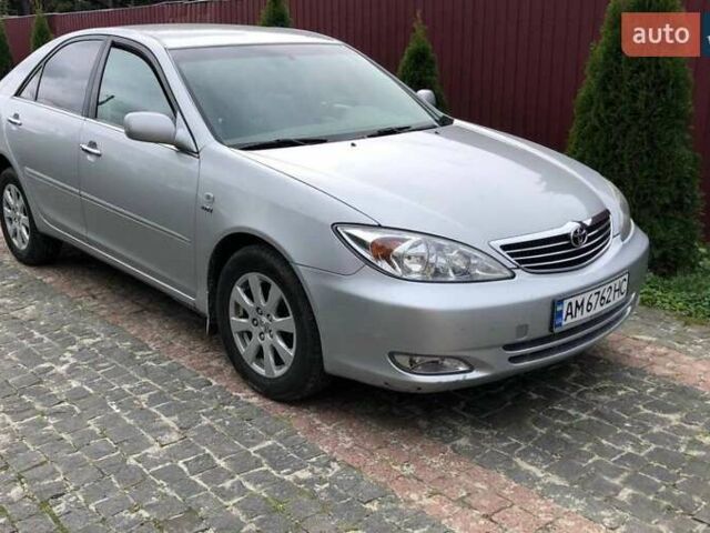 Серый Тойота Камри, объемом двигателя 2.4 л и пробегом 201 тыс. км за 5900 $, фото 1 на Automoto.ua