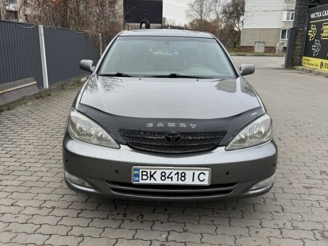 Сірий Тойота Камрі, об'ємом двигуна 3 л та пробігом 361 тис. км за 5500 $, фото 1 на Automoto.ua